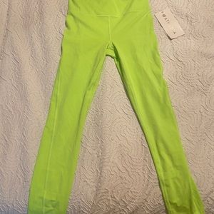 ATHLETA ULTIMATE STASH POCKET TIGHT 7/8